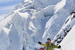 Three ski tourers on glacier