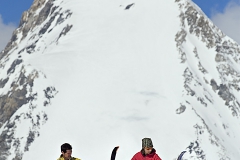 Skiers removing skins